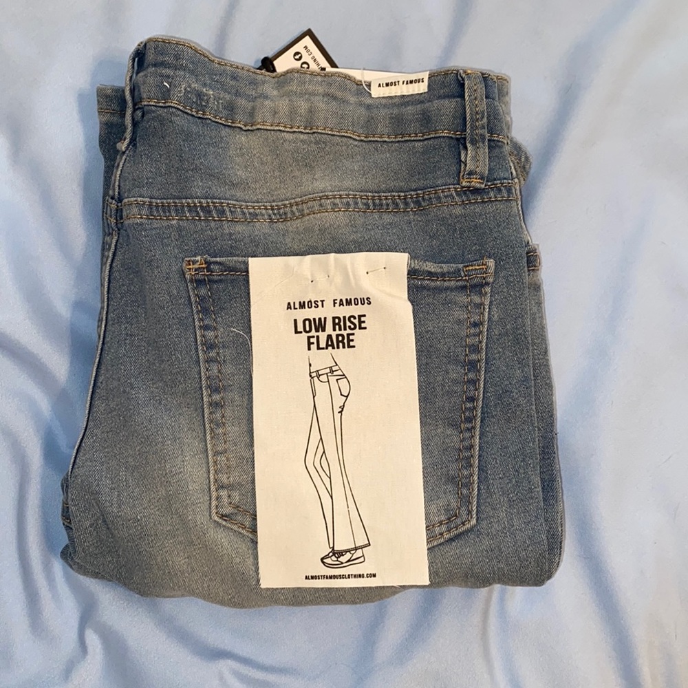 Rue 21, Almost Famous Low Rise Flare Jeans. Size 9